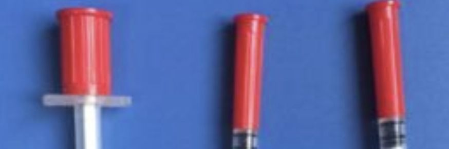 Red syringe caps